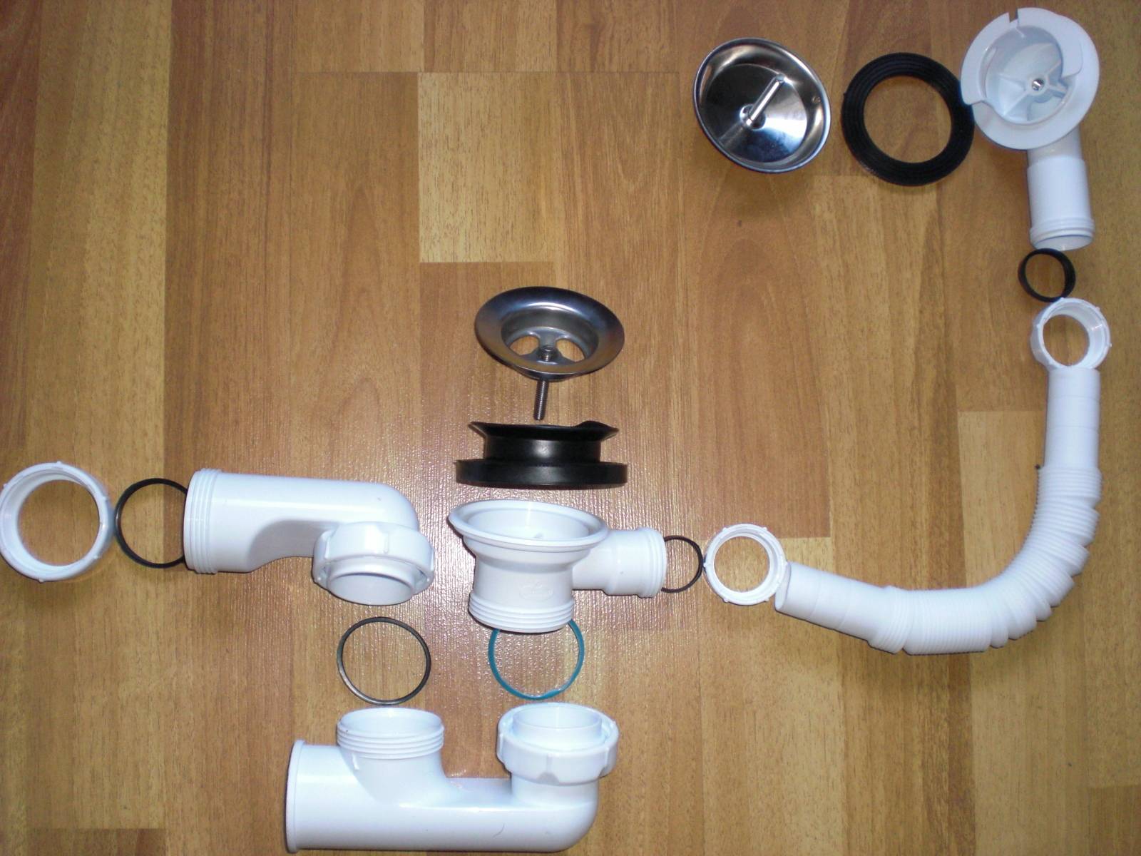 Как правильно установить сифон под ванной: необходимые материалы и инструменты